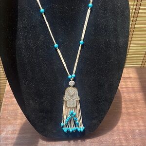 Elegant Turquoise and Brass Hamsa Necklace